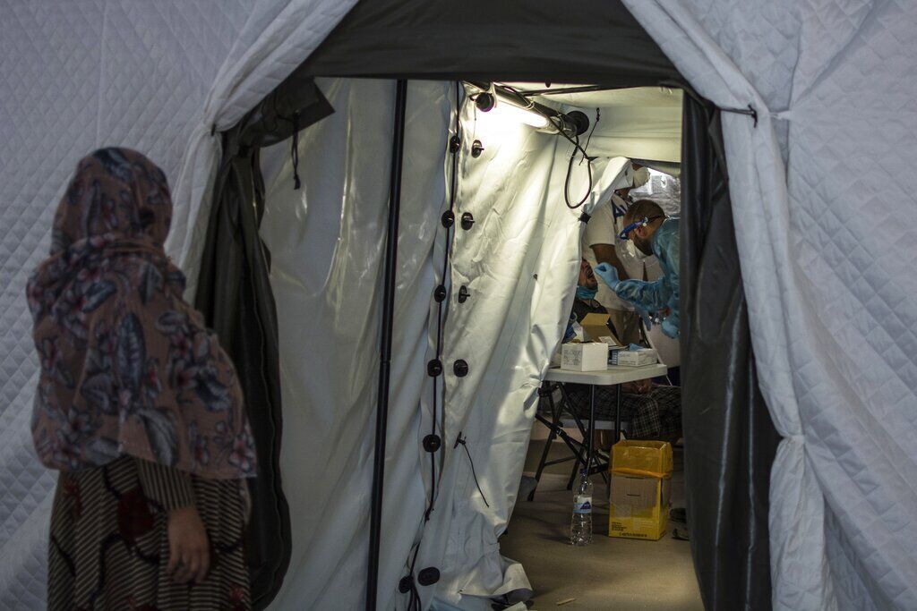 APTOPIX Virus Outbreak Greece Migrants